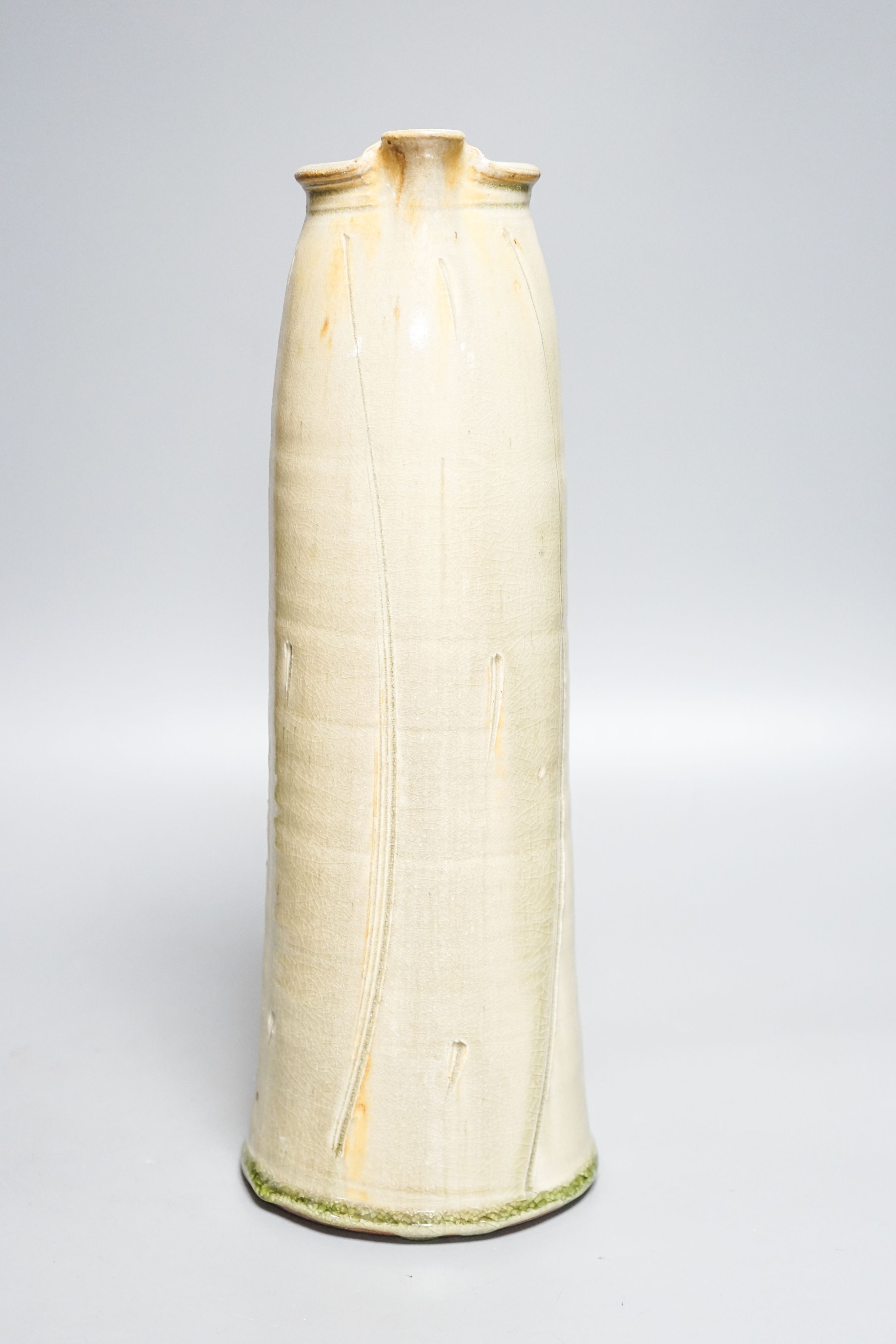 Stephen Parry (b.1950), a tall pale celadon glazed jug 39cm